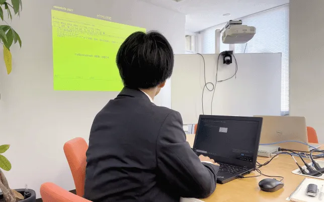 Rear view of interns reporting their results